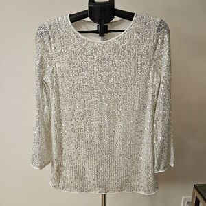 JM collection ivory tunic top with silver sequins.